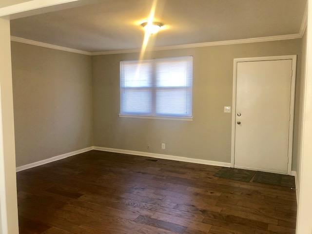 7820 Chester Road Fairview, TN 37062 - Photo 10 of 22 an empty room with wooden floor and windows