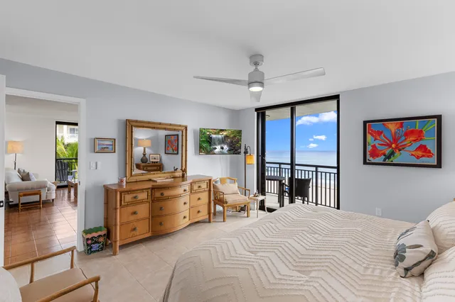 a bathroom with a double vanity sink toilet and shower