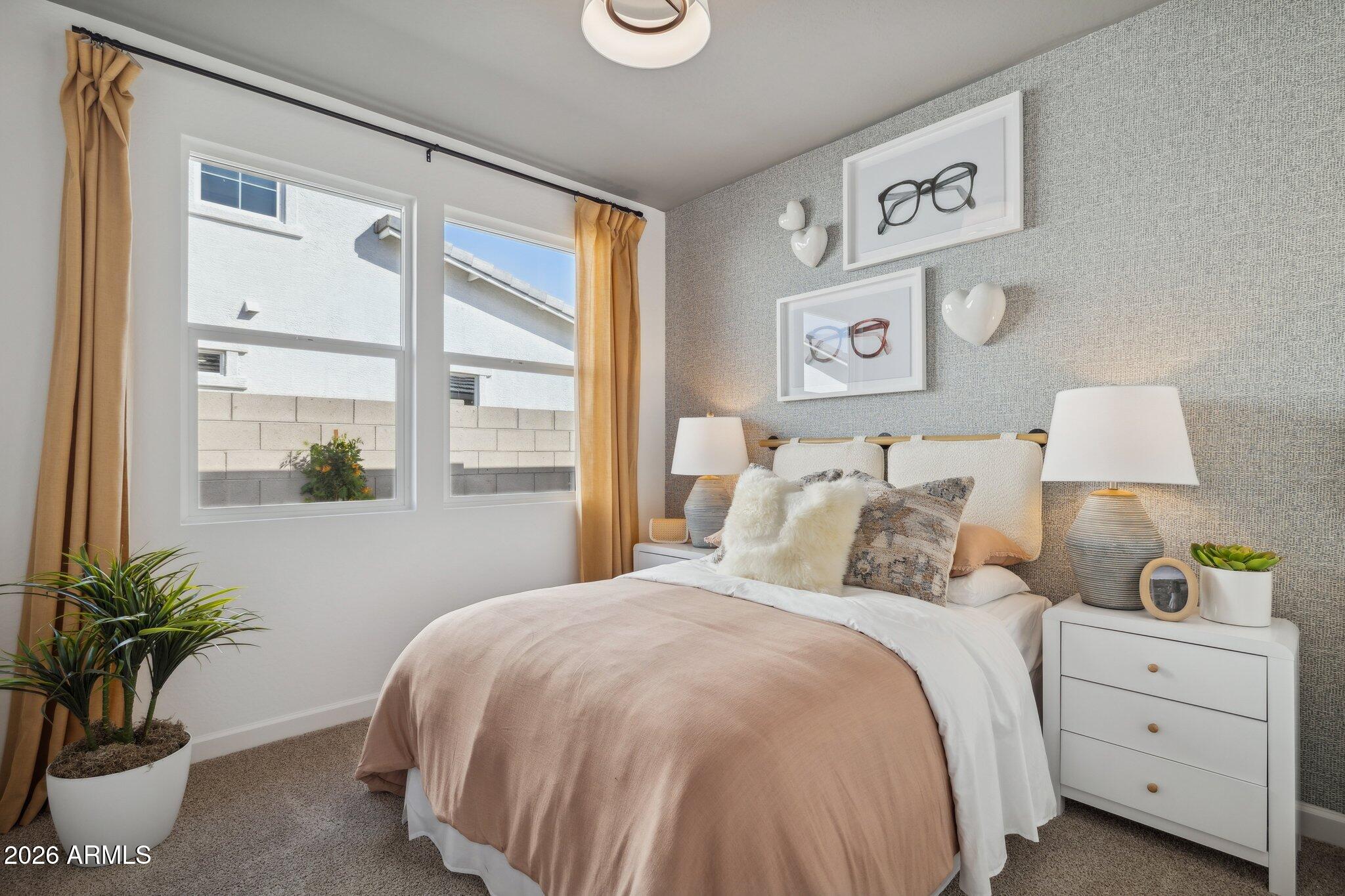 26449 West Crown King Road Buckeye, AZ 85326 - Photo 22 of 33 a bedroom with a bed and a window