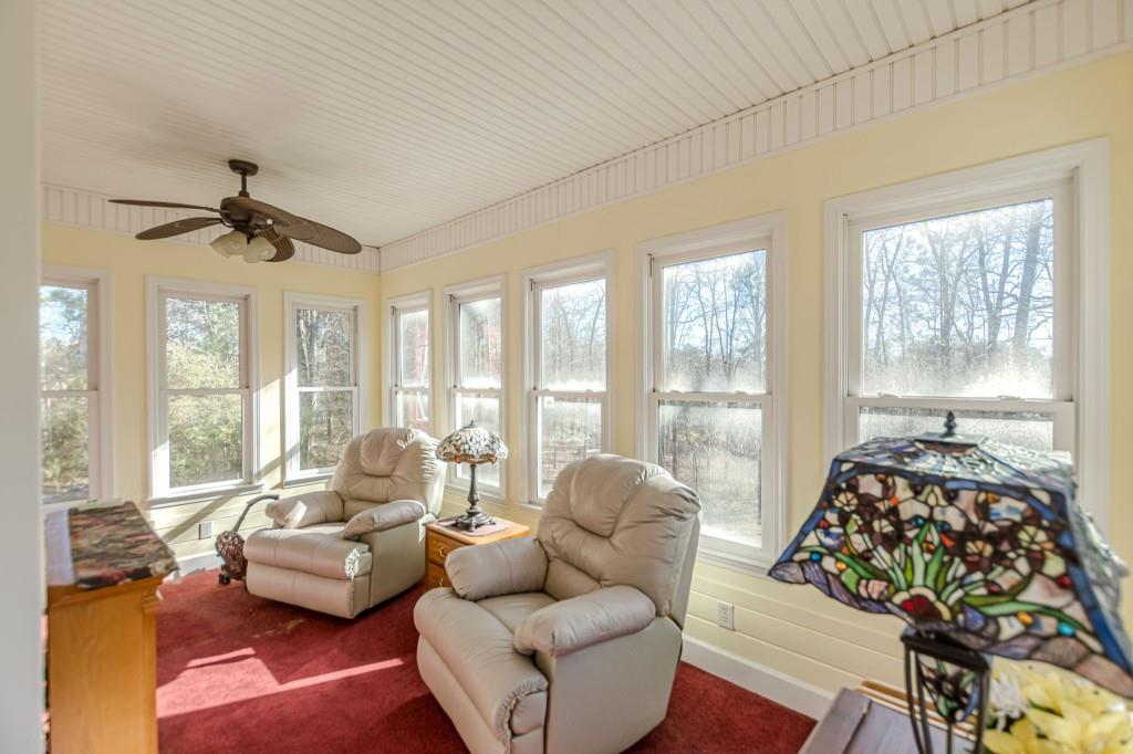 4346 Leola Road Douglasville, GA 30135 - Photo 12 of 59 a living room with furniture and a large window