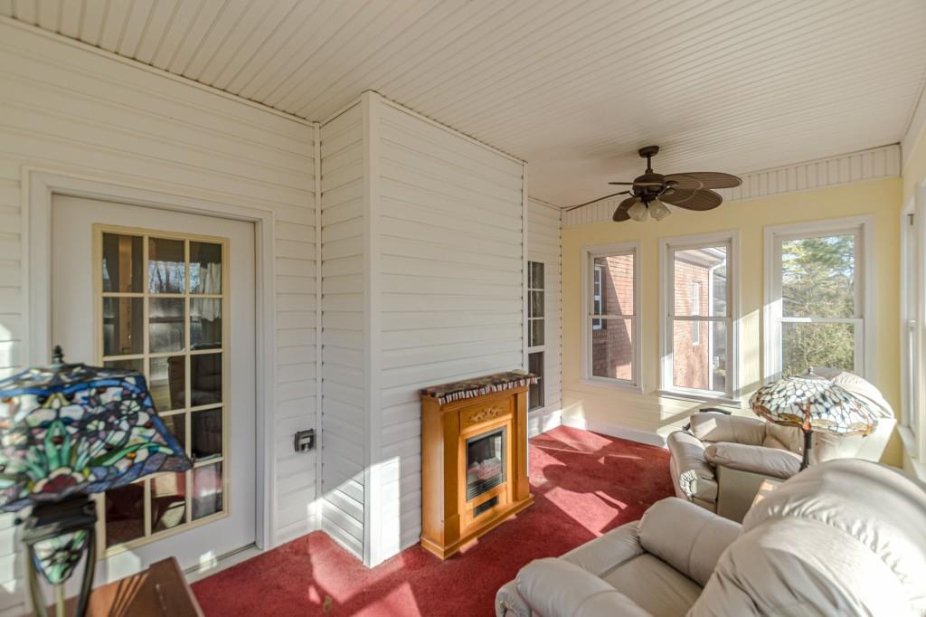 4346 Leola Road Douglasville, GA 30135 - Photo 13 of 59 a living room with furniture and a large window