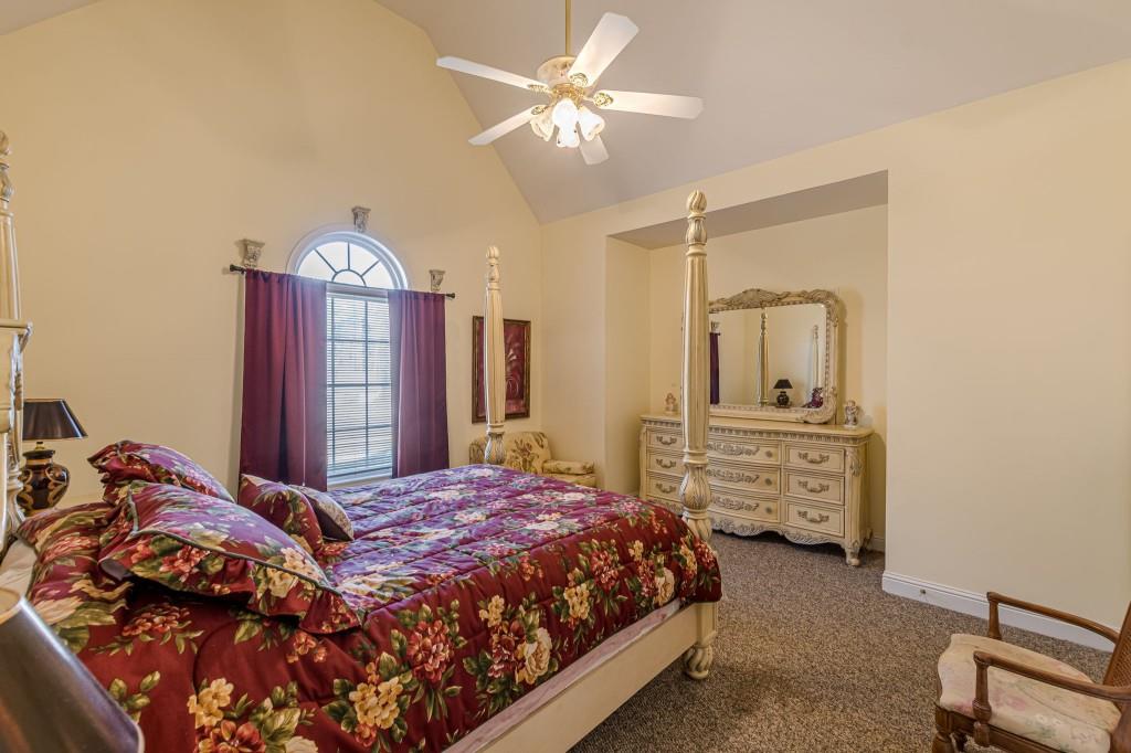 4346 Leola Road Douglasville, GA 30135 - Photo 40 of 59 a bedroom with a bed dresser and a window