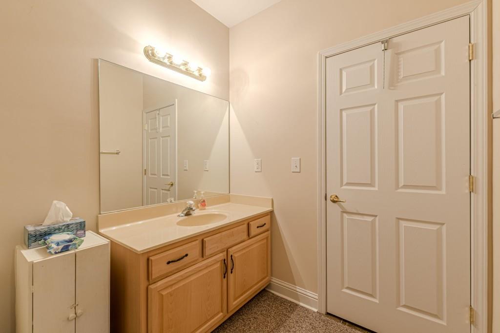 4346 Leola Road Douglasville, GA 30135 - Photo 51 of 59 a utility room with sink dryer and washer