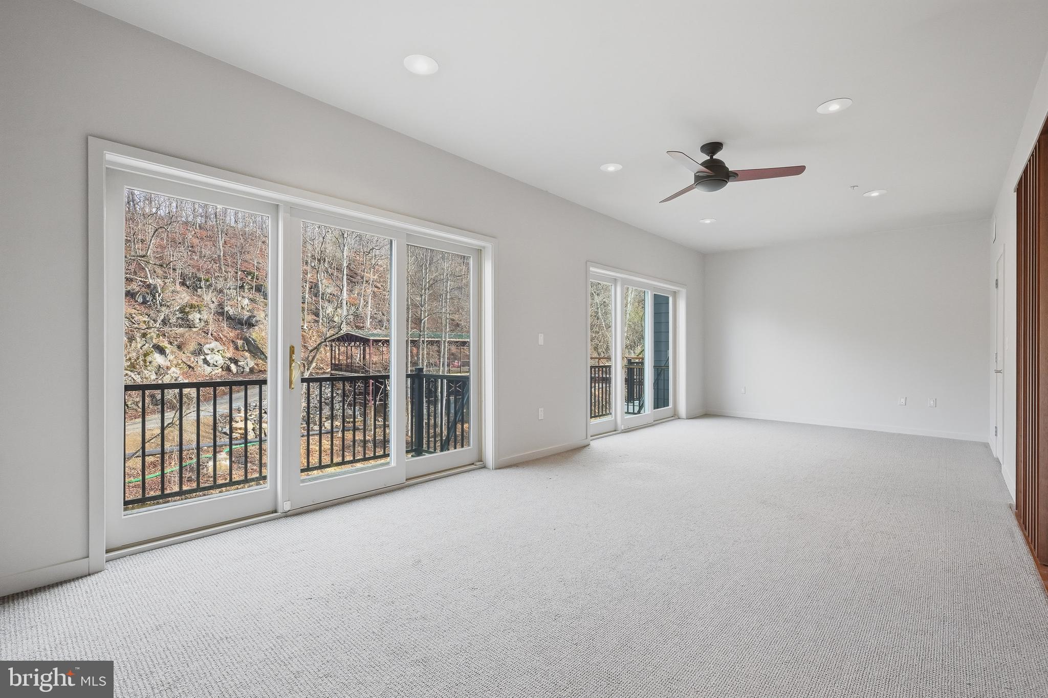 118 Bancroft Mills Road Wilmington, DE 19806 - Photo 17 of 36 a view of an empty room with windows