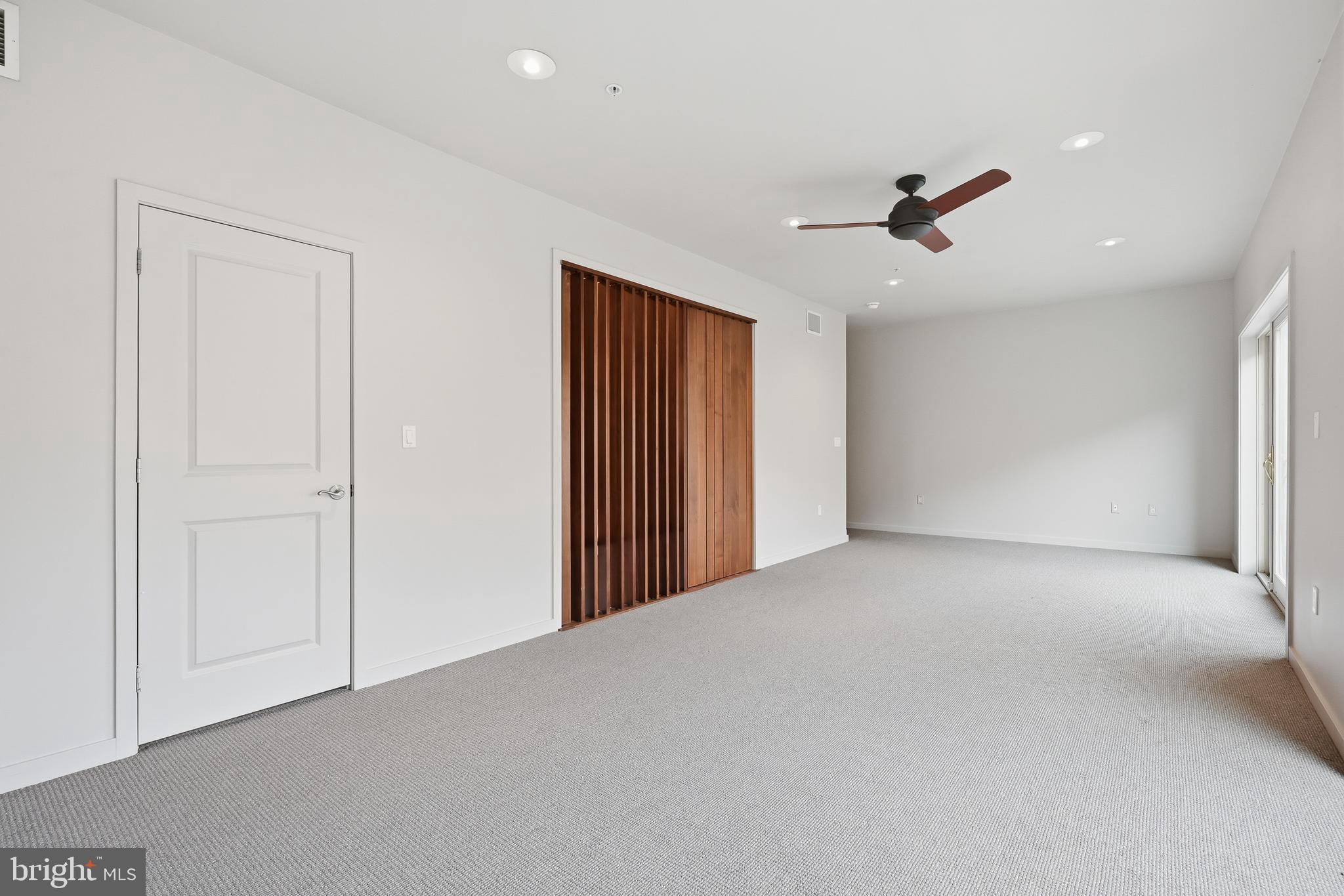 118 Bancroft Mills Road Wilmington, DE 19806 - Photo 20 of 36 a view of a livingroom with a ceiling fan