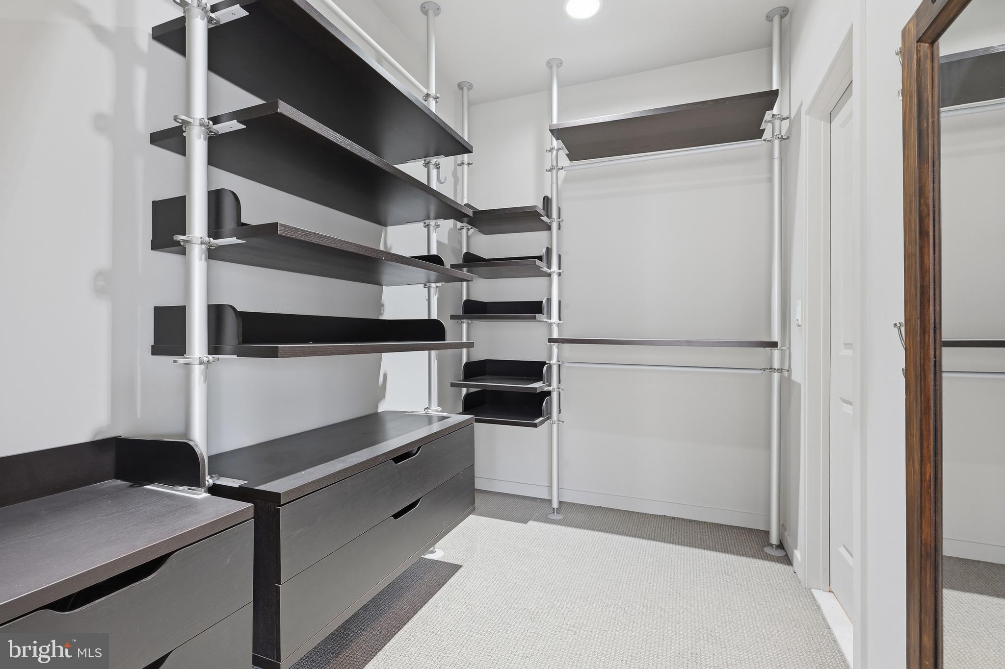 118 Bancroft Mills Road Wilmington, DE 19806 - Photo 22 of 36 a kitchen with cabinets and a refrigerator