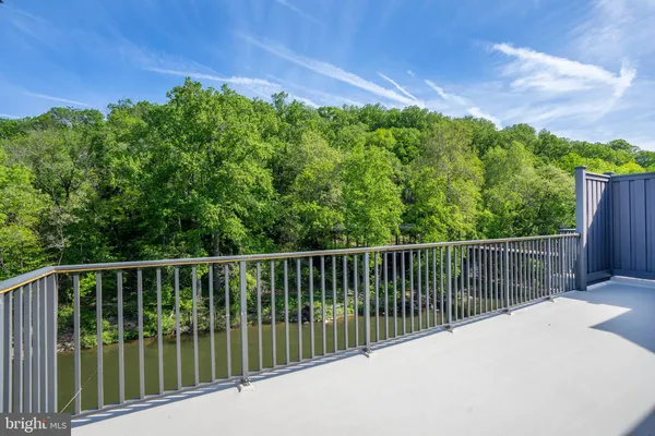 a view of a balcony with lake view