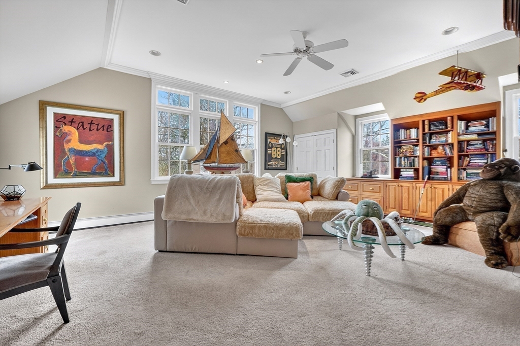 107 Westford Road Concord, MA 01742 - Photo 13 of 34 a living room with furniture and large windows