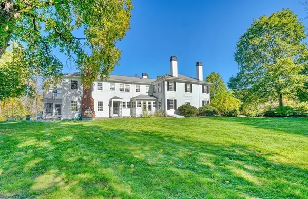 a view of a house with a big yard