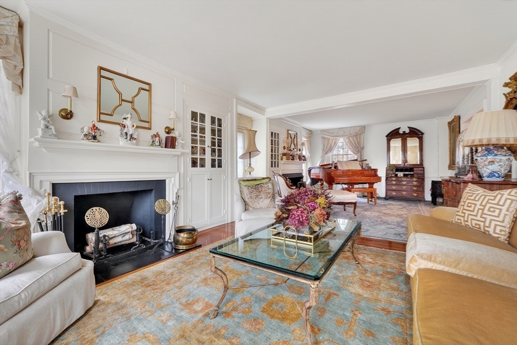 107 Westford Road Concord, MA 01742 - Photo 10 of 34 a living room with furniture and a fireplace
