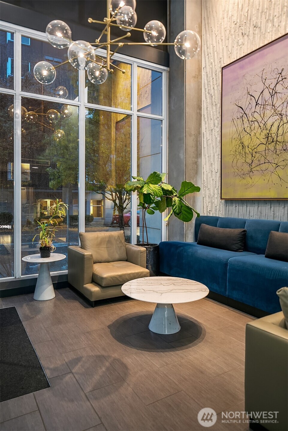 76 Cedar Street, Unit 405 Seattle, WA 98121 - Photo 16 of 32 a living room with furniture and a large window