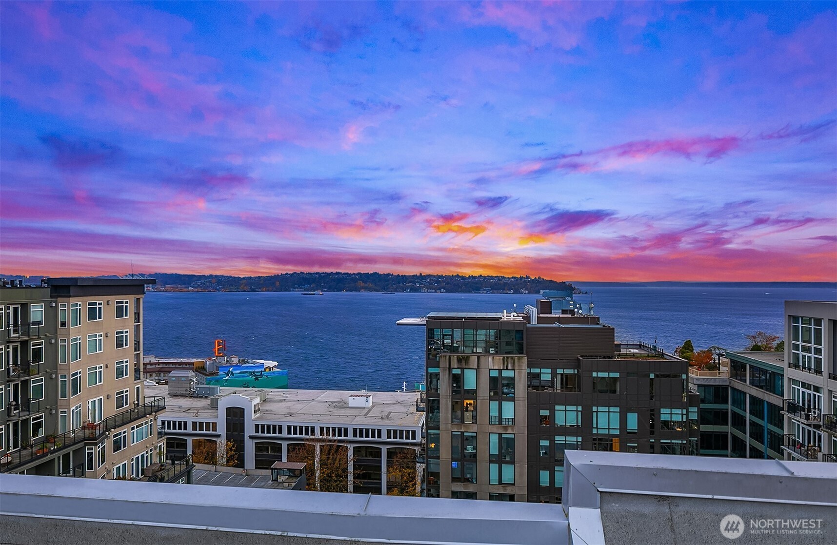 76 Cedar Street, Unit 405 Seattle, WA 98121 - Photo 18 of 32 a view of a city with tall buildings