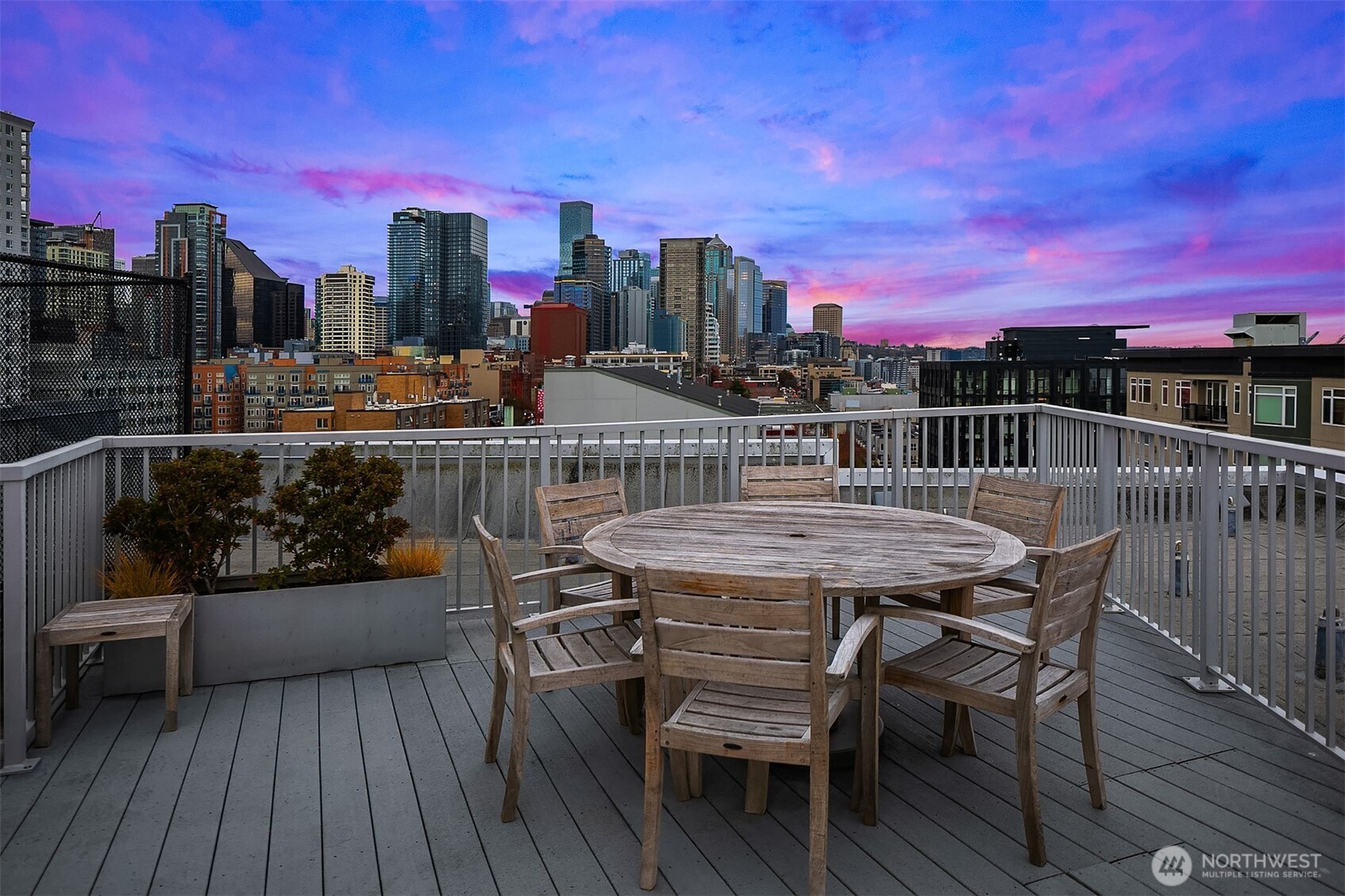 76 Cedar Street, Unit 405 Seattle, WA 98121 - Photo 20 of 32 a view of a chairs on the roof deck