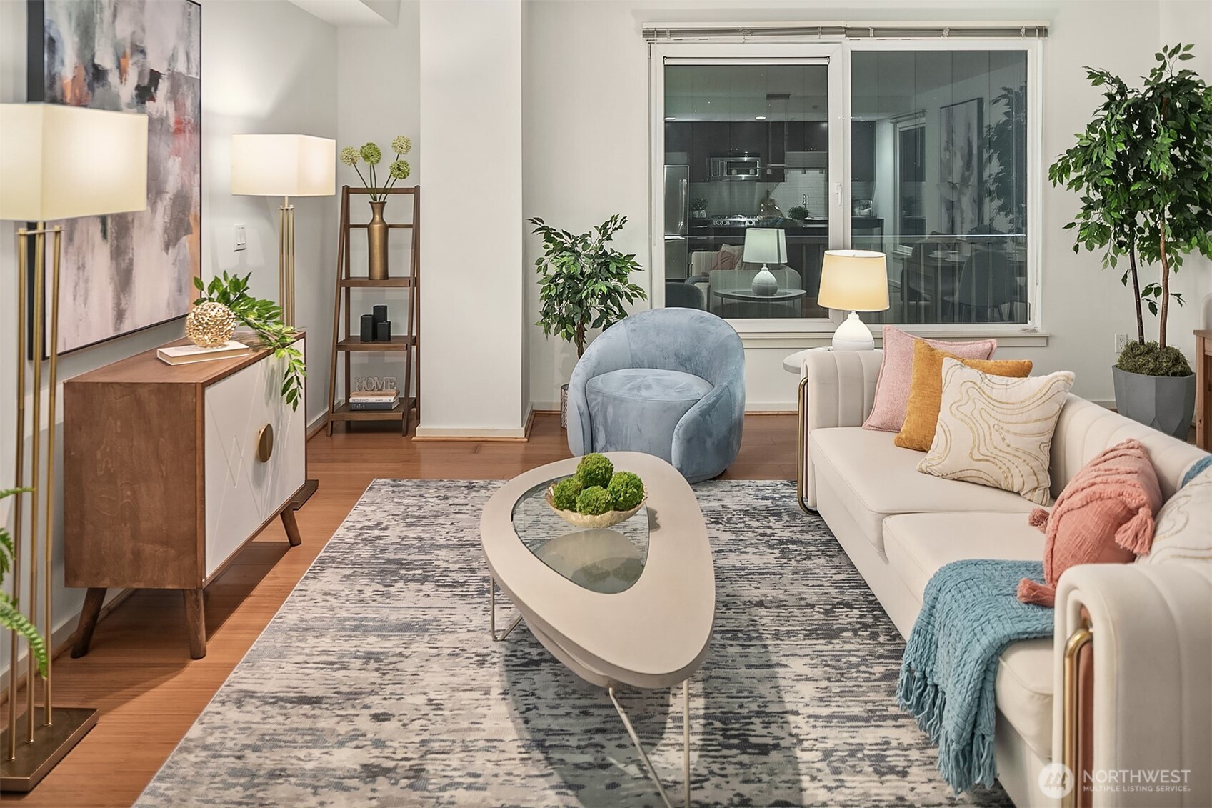 76 Cedar Street, Unit 405 Seattle, WA 98121 - Photo 4 of 32 a living room with furniture and a rug