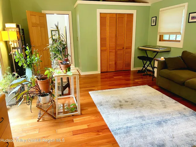 a living room with patio furniture