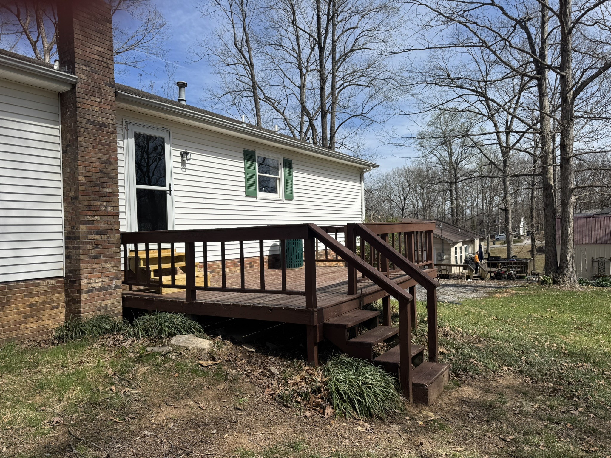 226 Nottingham Road Dickson, TN 37055 - Photo 2 of 17 a view of a wooden bench and trees in the yard