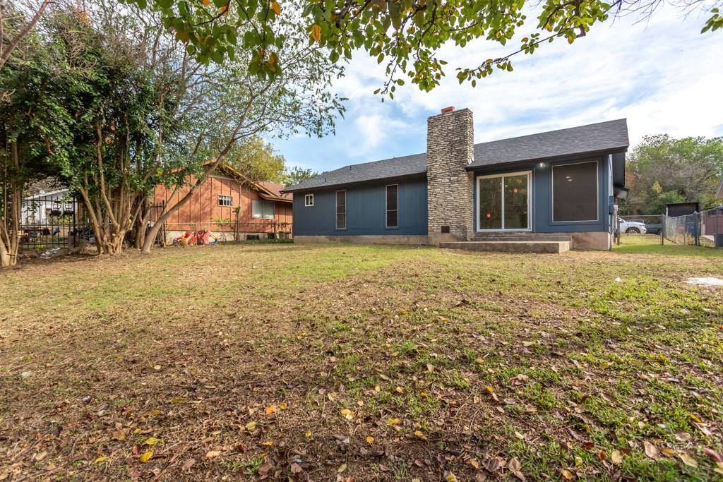 9604 Crown Ridge Road Austin, TX 78753 - Photo 24 of 24 A spacious yard offers ample outdoor enjoyment and potential for landscaping enhancements.