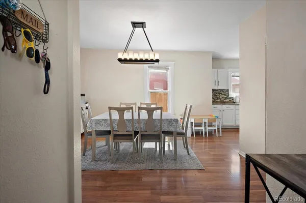 a view of a dining room with furniture