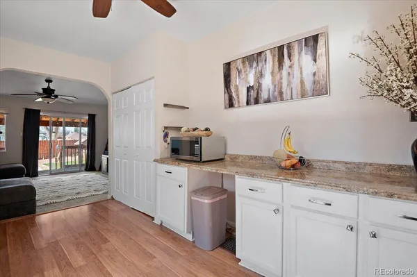 a kitchen with sink cabinets and window