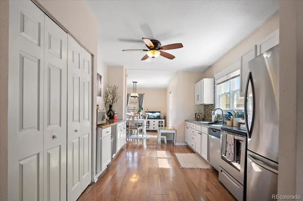 a view of a living room and wooden floor