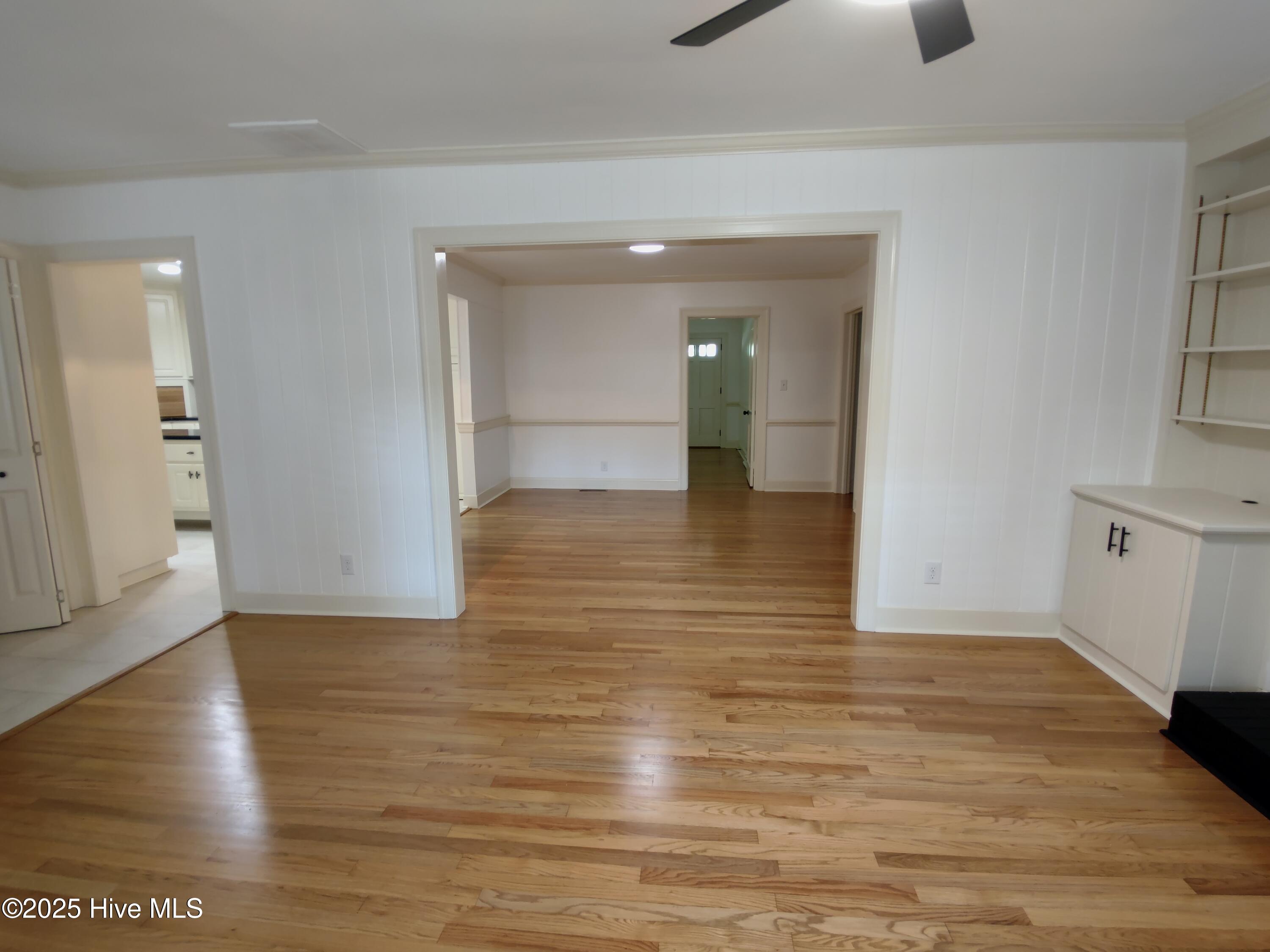 1109 Treemont Road Northwest Wilson, NC 27896 - Photo 3 of 20 looking into dining area from the back living room/ den