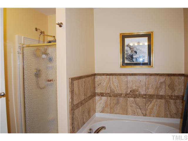2938 Settle In Lane Raleigh, NC 27614 - Photo 8 of 12 Notice the Upgraded Tile Along the Tub!