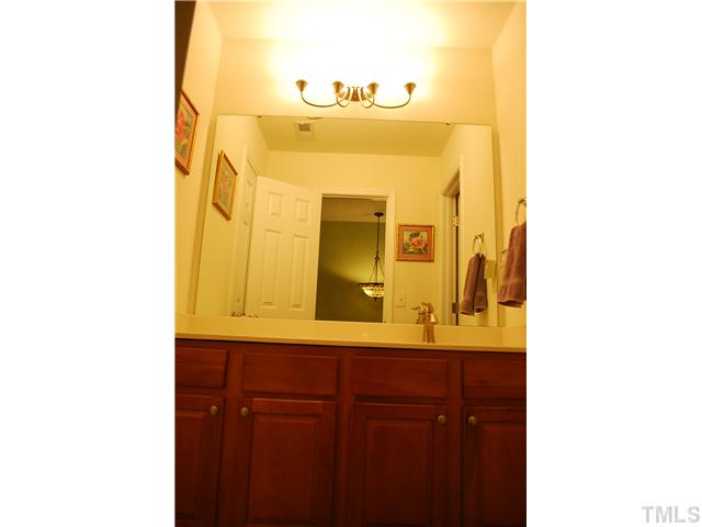 2938 Settle In Lane Raleigh, NC 27614 - Photo 10 of 12 Second bathroom has vanity area and a private shower and water closet