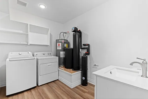 a utility room with dryer and washer