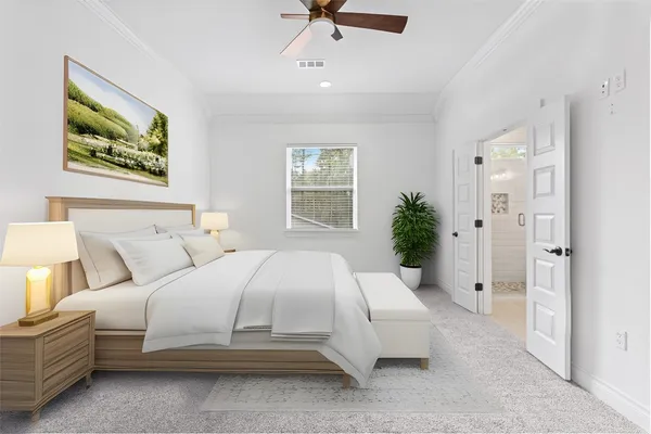 a bedroom with bed and a chandelier