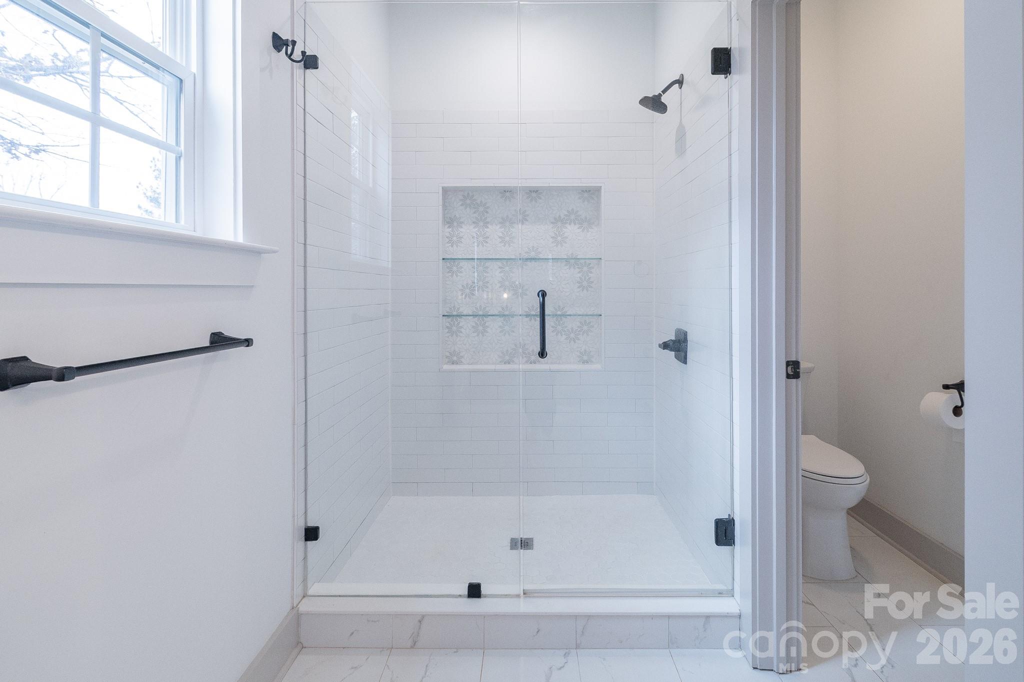 731 Miles Road Dallas, NC 28034 - Photo 27 of 45 a bathroom with a bathtub and a shower