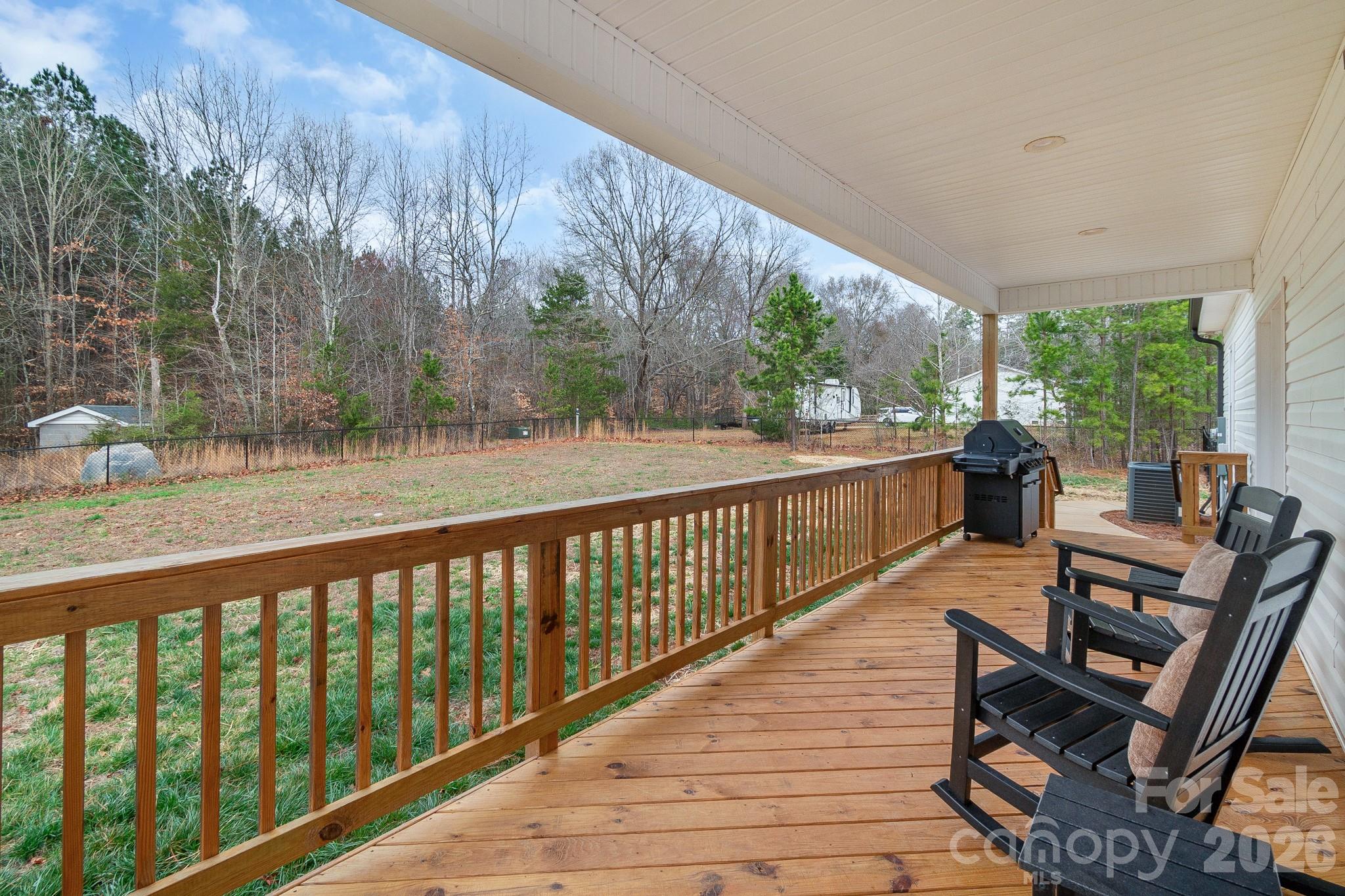 731 Miles Road Dallas, NC 28034 - Photo 37 of 45 a view of balcony with couch and wooden floor