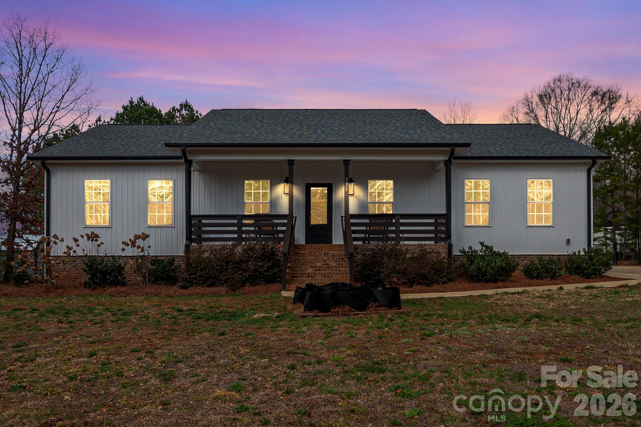 731 Miles Road Dallas, NC 28034 - Photo 40 of 45 a front view of a house with a yard