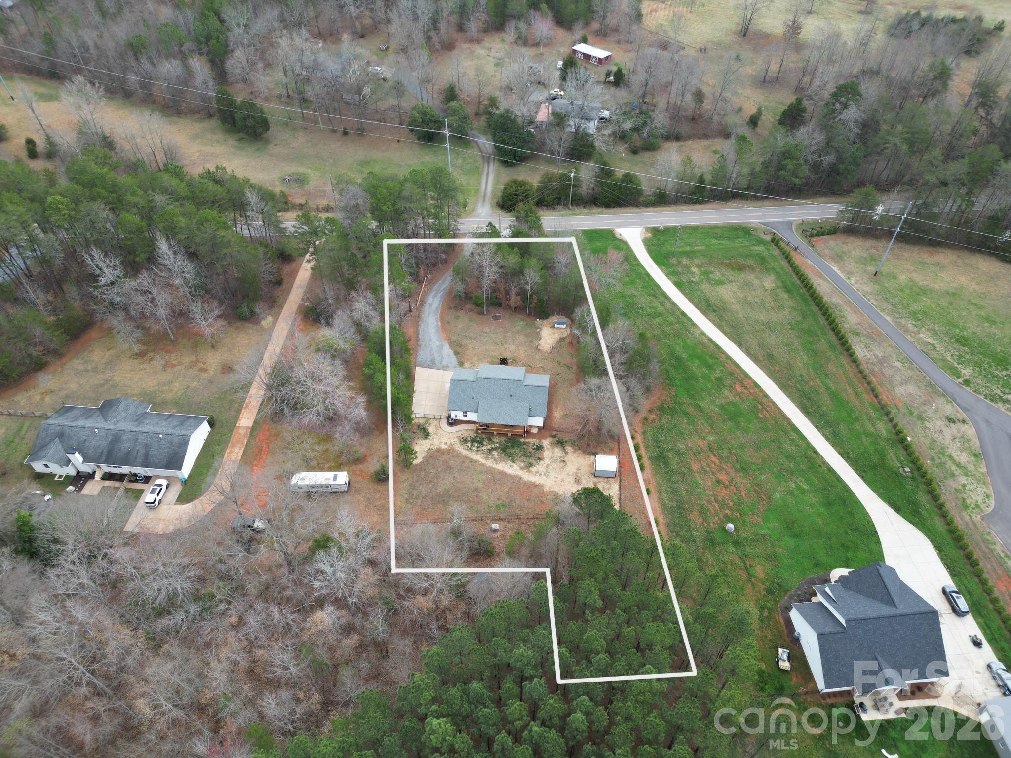 731 Miles Road Dallas, NC 28034 - Photo 43 of 45 an aerial view of a house
