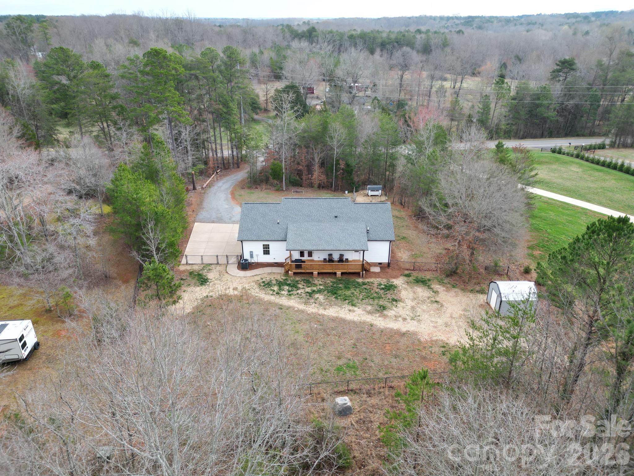 731 Miles Road Dallas, NC 28034 - Photo 44 of 45 an aerial view of a house with a yard basket ball court and outdoor seating