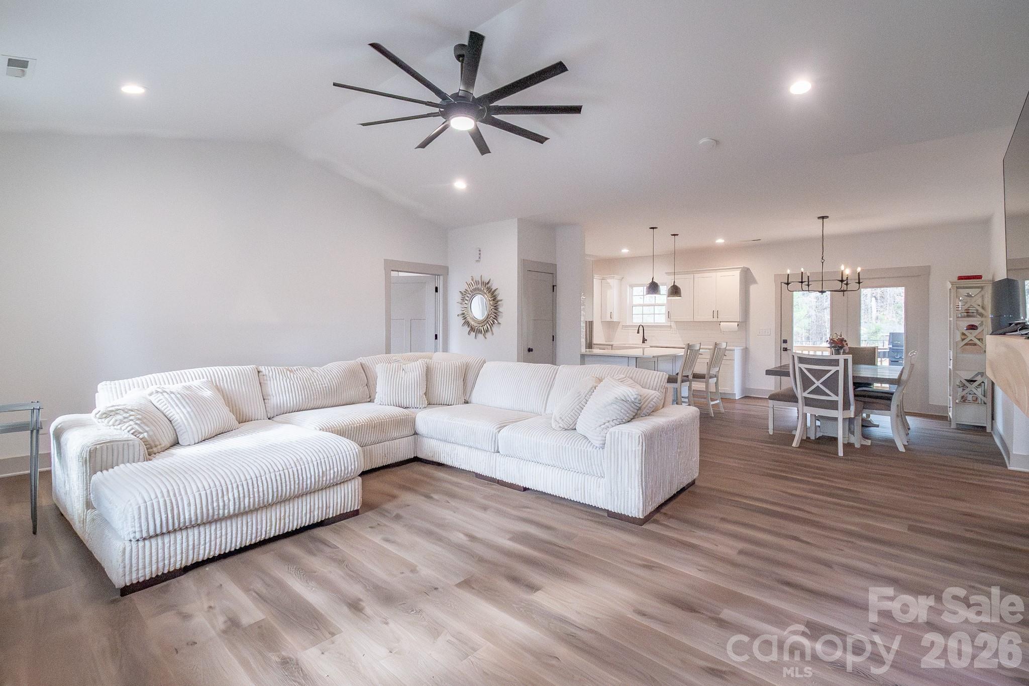 731 Miles Road Dallas, NC 28034 - Photo 7 of 45 a living room with furniture and a view of kitchen