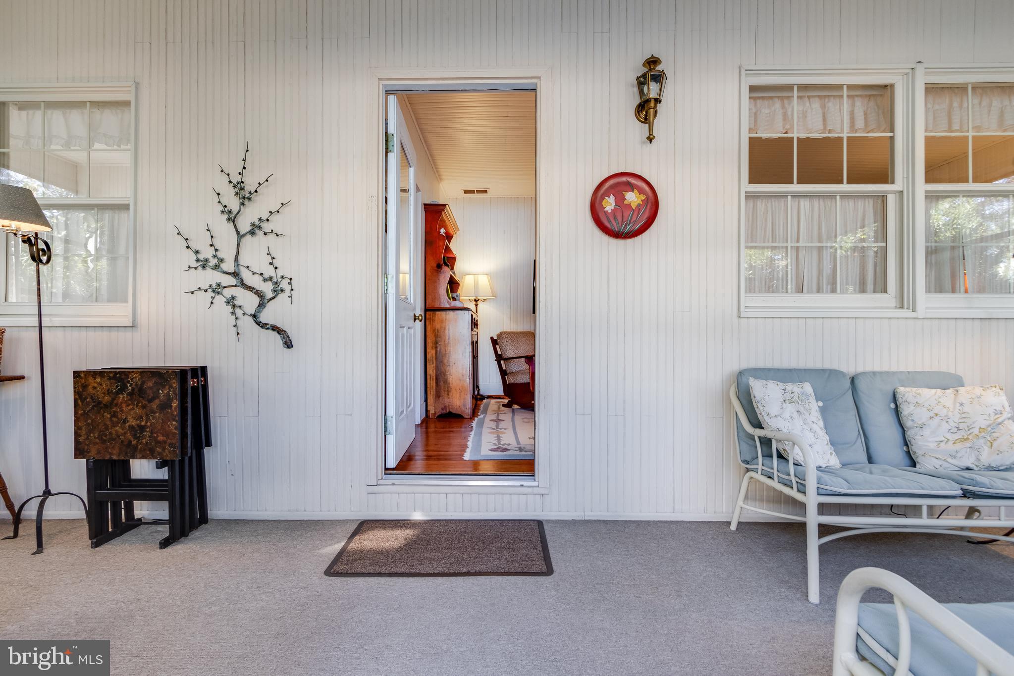 28 Delaware Avenue Rehoboth Beach, DE 19971 - Photo 15 of 44 a view of livingroom with furniture and window