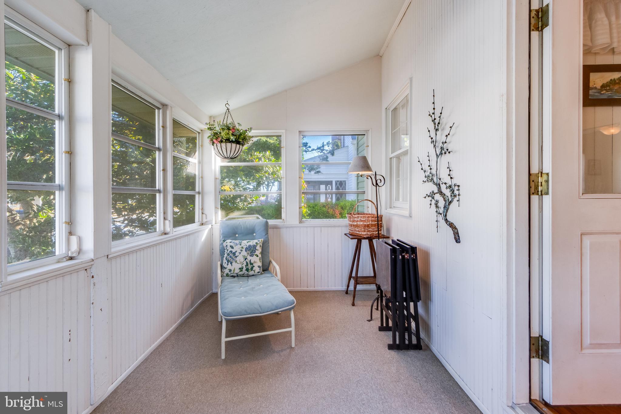 28 Delaware Avenue Rehoboth Beach, DE 19971 - Photo 17 of 44 a living room with furniture and a window