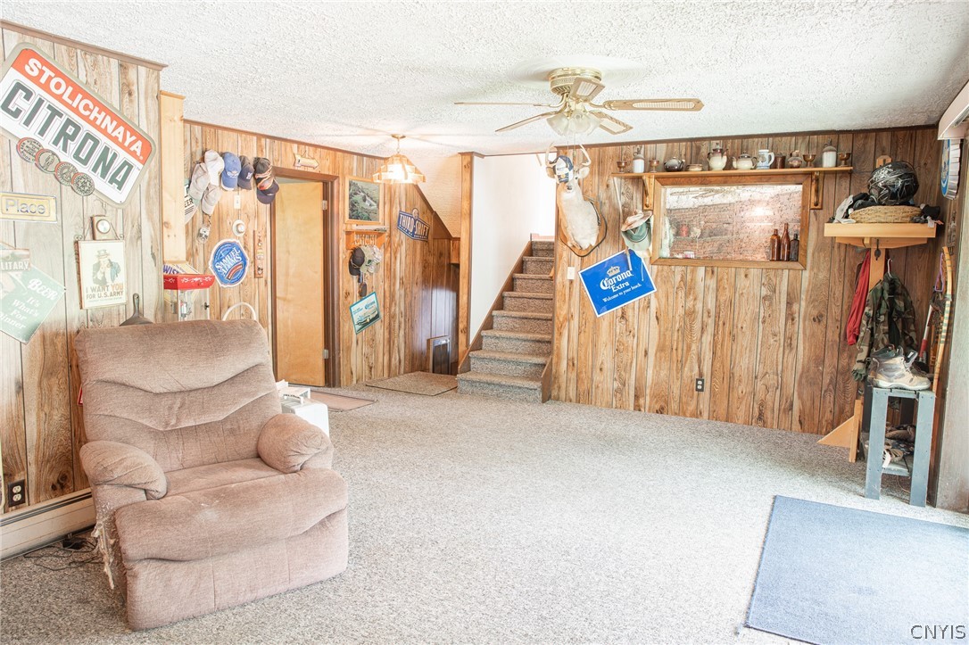 671 Goodrich Hill Road Locke, NY 13092 - Photo 25 of 37 Stairs lead down to the garage