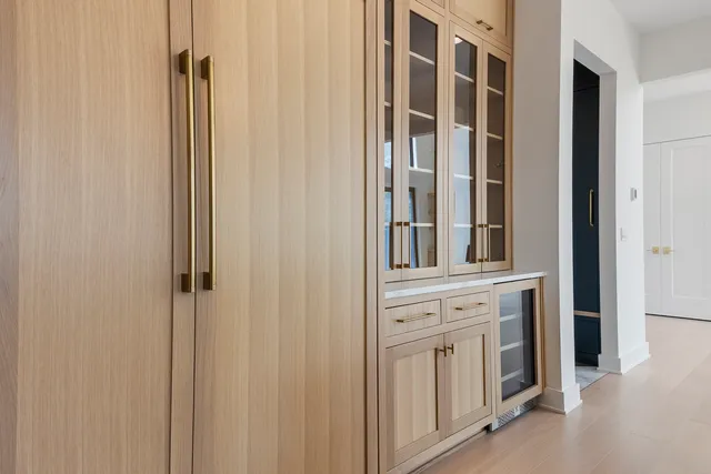 a kitchen with stainless steel appliances a stove and a microwave