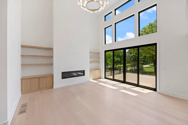 a view of a kitchen with a large window