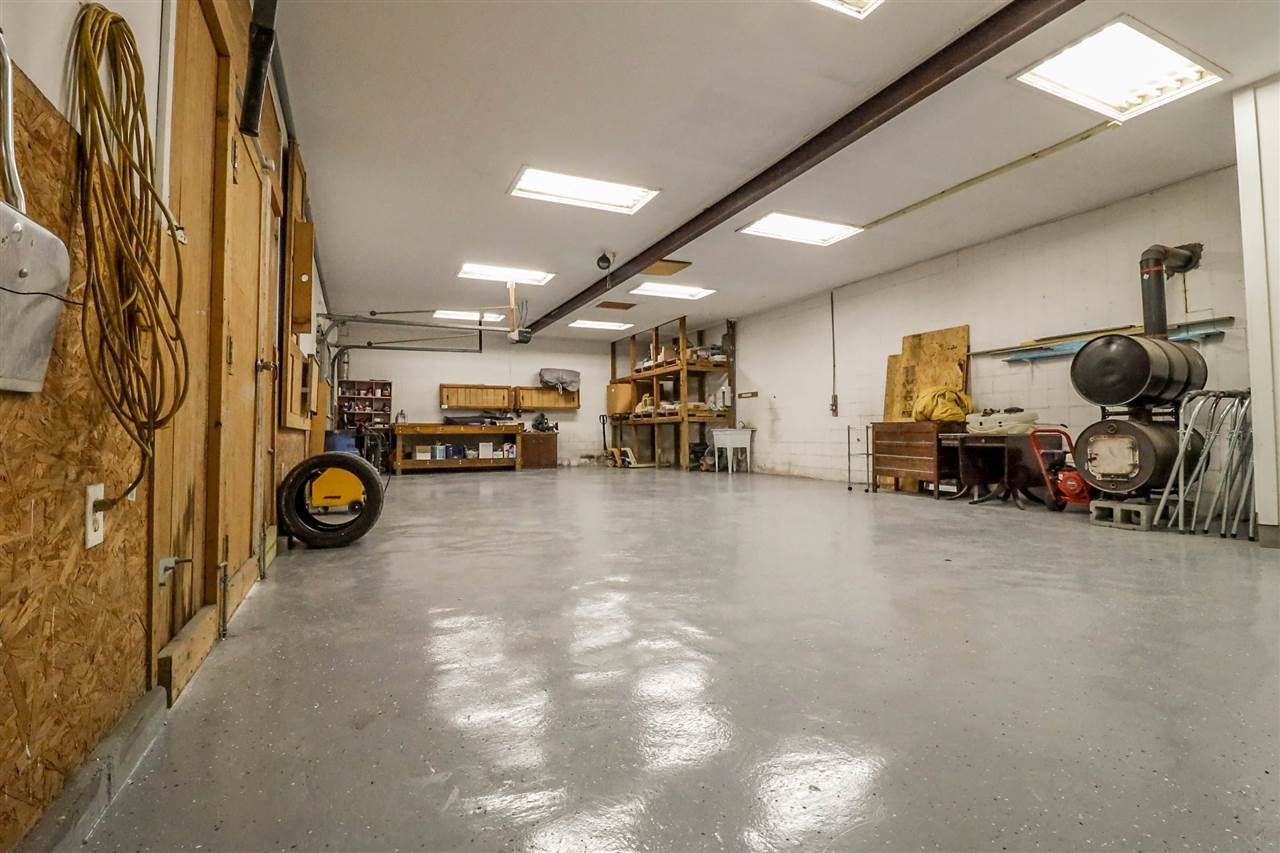 7745 Rock Quarry Road Raleigh, NC 27610 - Photo 23 of 25 Garage/Workshop equipped with a half bath.