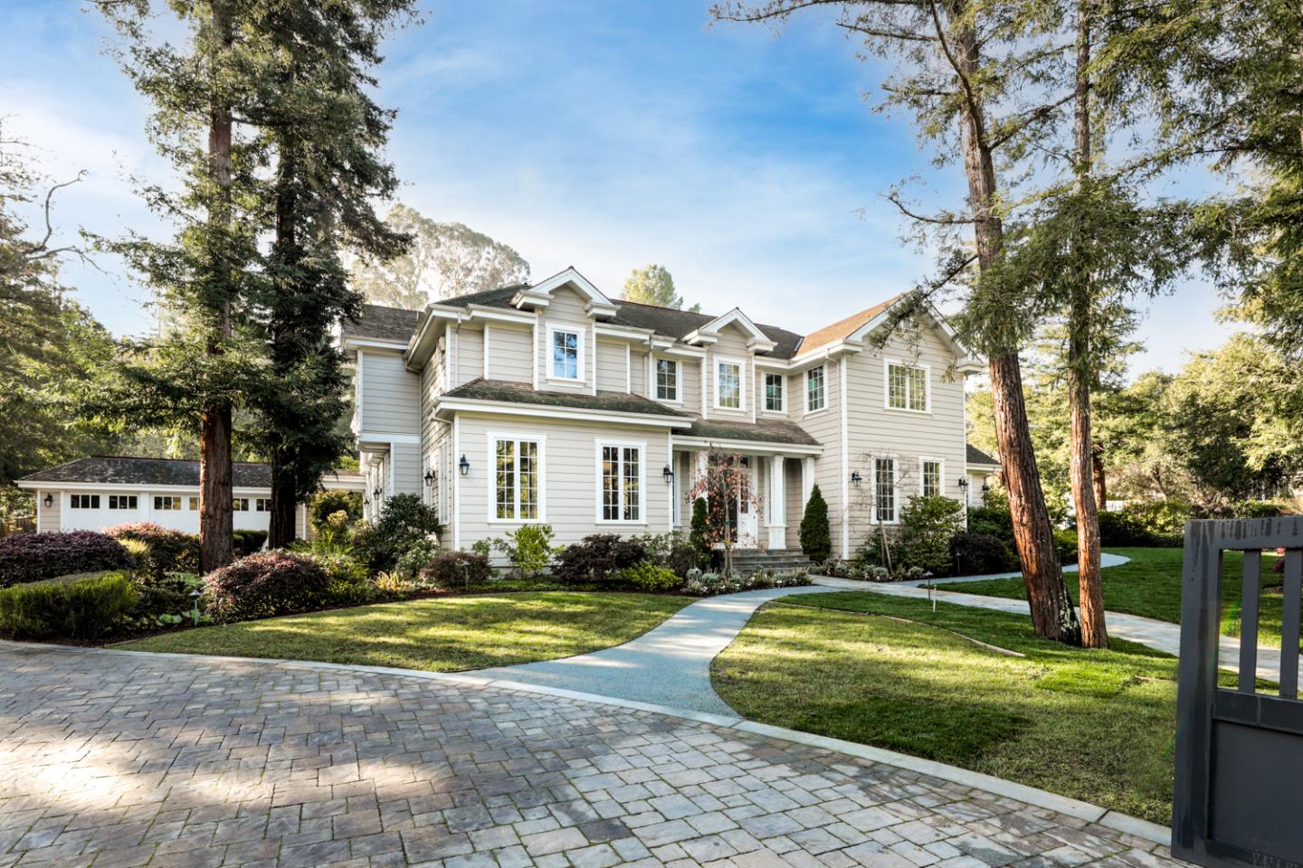1 Sutherland Drive Atherton, CA 94027 - Photo 1 of 32 a front view of a house with a yard