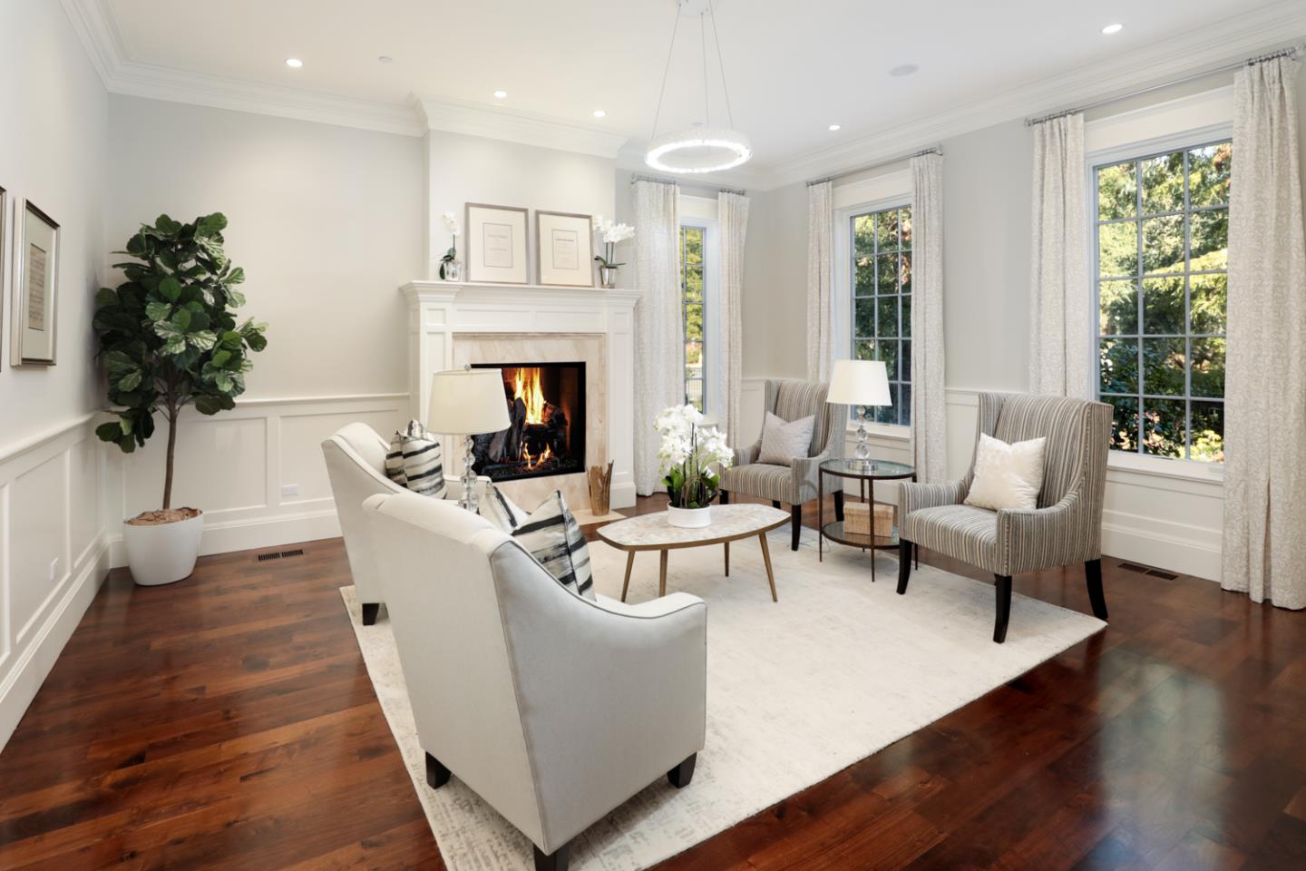 1 Sutherland Drive Atherton, CA 94027 - Photo 13 of 32 a living room with furniture and a fireplace