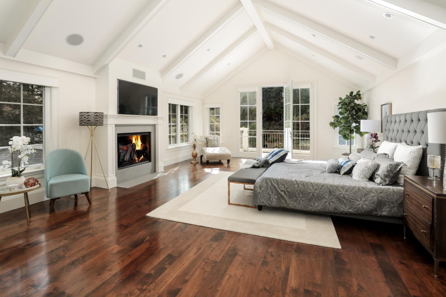 1 Sutherland Drive Atherton, CA 94027 - Photo 21 of 32 a living room with furniture large window and a fireplace