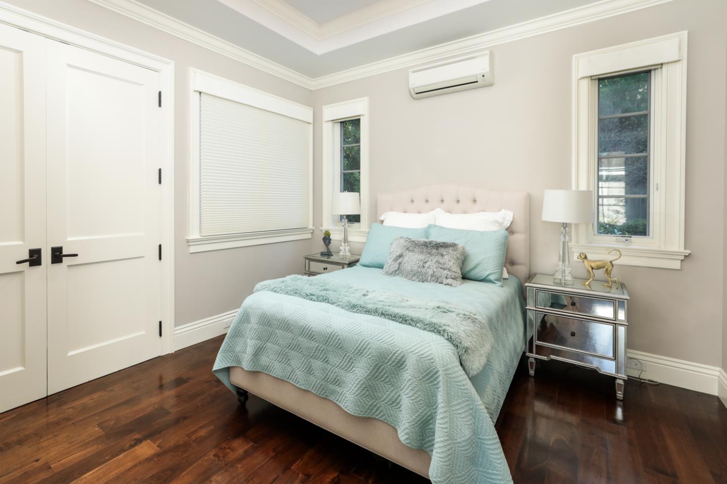 1 Sutherland Drive Atherton, CA 94027 - Photo 27 of 32 a bedroom with a bed and wooden floor