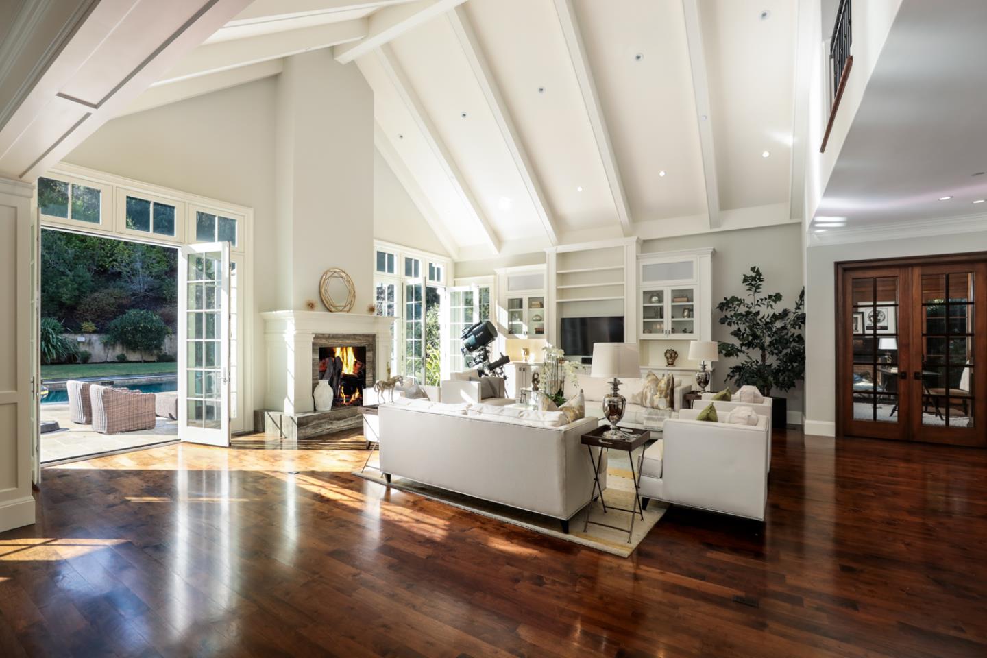 1 Sutherland Drive Atherton, CA 94027 - Photo 28 of 32 a living room with fireplace furniture and a large window