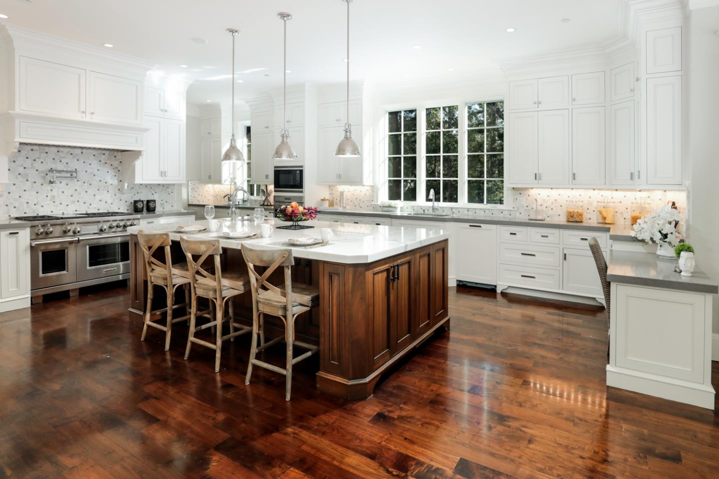 1 Sutherland Drive Atherton, CA 94027 - Photo 32 of 32 a kitchen with stainless steel appliances granite countertop a stove and a wooden floors