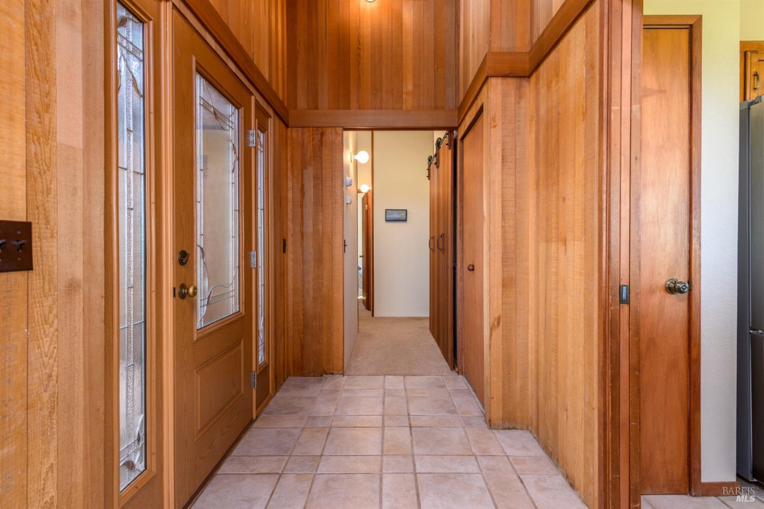 39153 Curlew Reach The Sea Ranch, CA 95497 - Photo 19 of 31 a view of a hallway with wooden walls