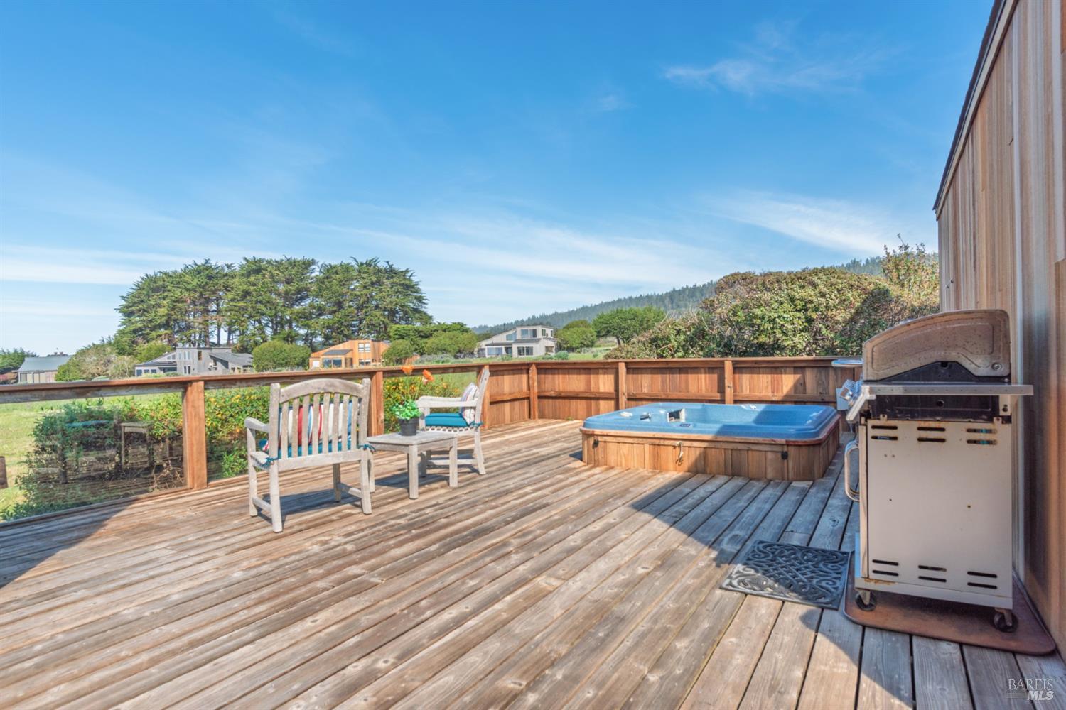 39153 Curlew Reach The Sea Ranch, CA 95497 - Photo 7 of 31 a view of a balcony with wooden floor and outdoor seating