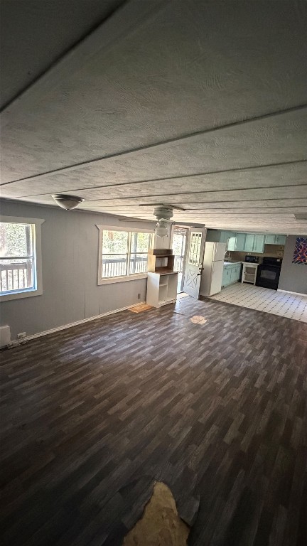 504 Bob Wills Road Livingston, TX 77351 - Photo 10 of 15 a view of empty room with wooden floor and fan